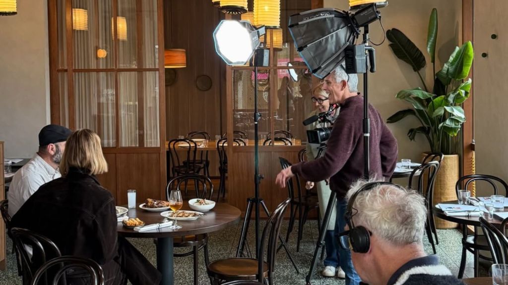 The Postcards Channel 9 team filming a feature at East Brunswick Village in Brunswick East, Melbourne.
